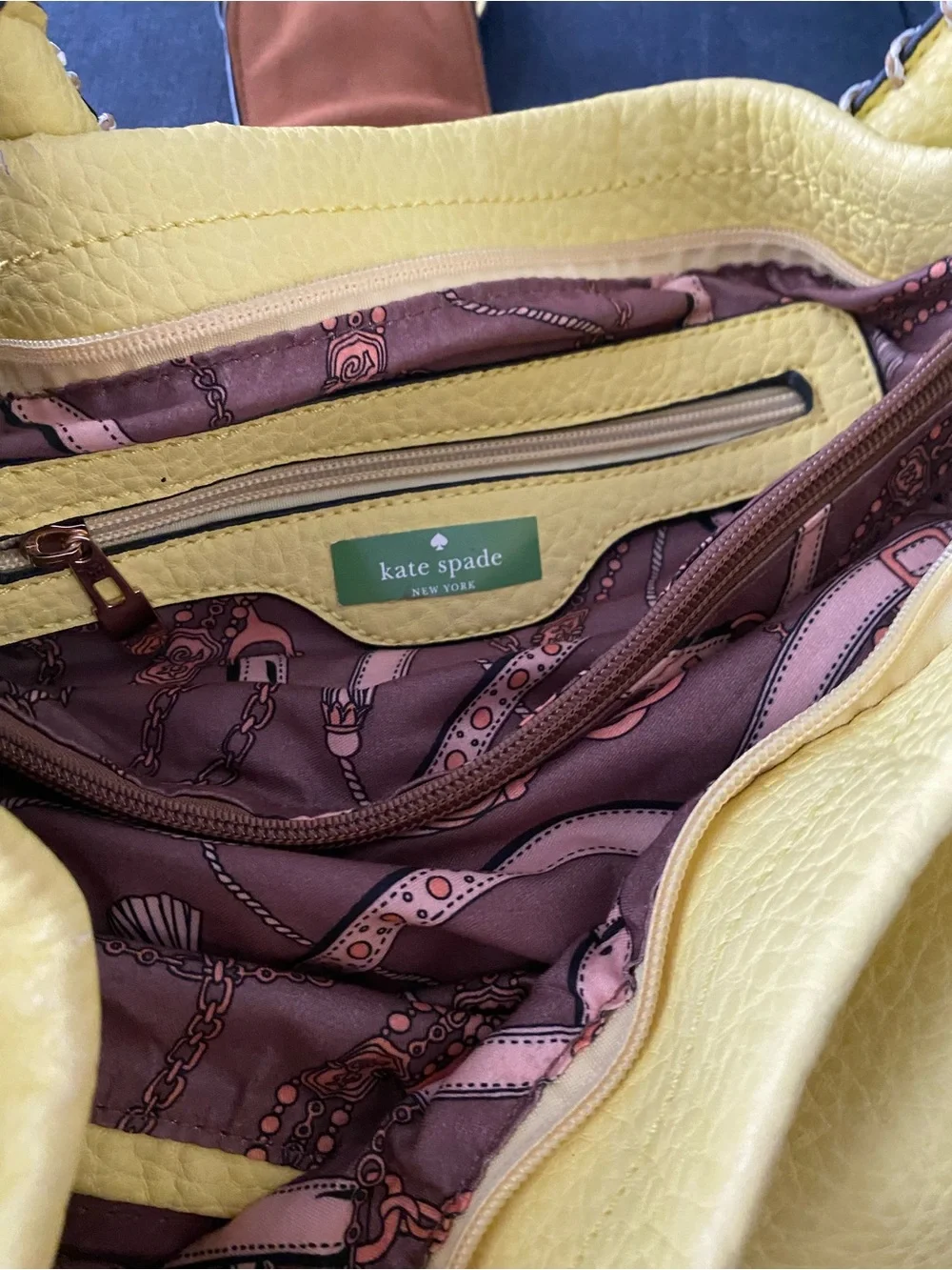 Kate Spade Yellow Leather Shoulder Bag with Decorative Ring Accent